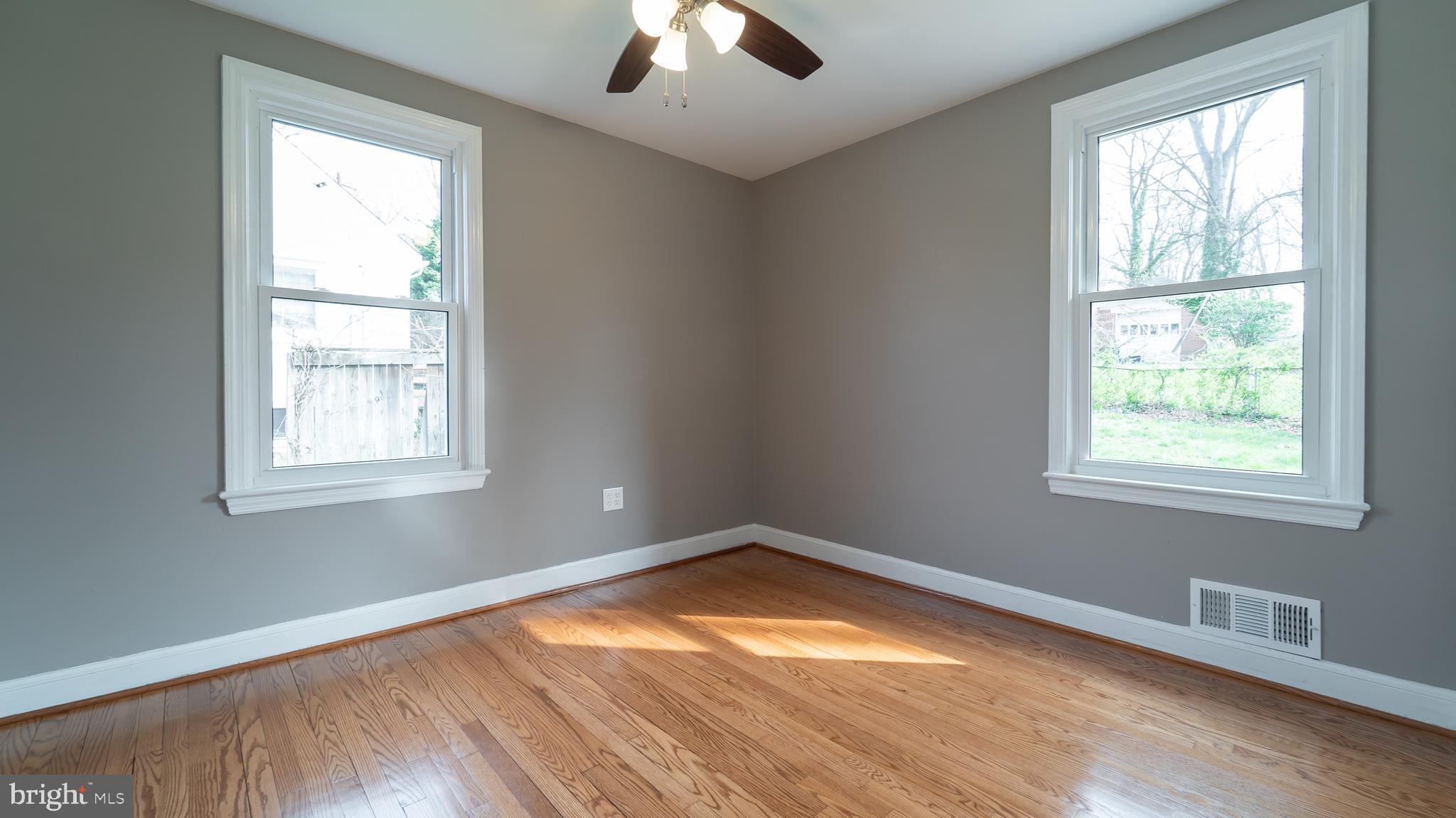 7005 Adelphi Road University Park, MD 20782 - Photo 19 of 39 Main 1st Bedroom with Ceiling Fan