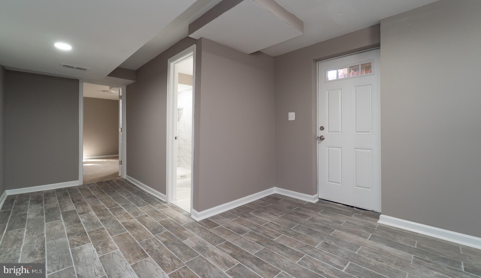 7005 Adelphi Road University Park, MD 20782 - Photo 2 of 39 Lower Level Basement/ Bedroom , Full Ba & More