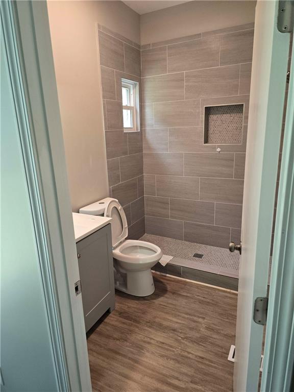 2863 Maysville Road Commerce, GA 30529 - Photo 8 of 15 a bathroom with a toilet and a shower