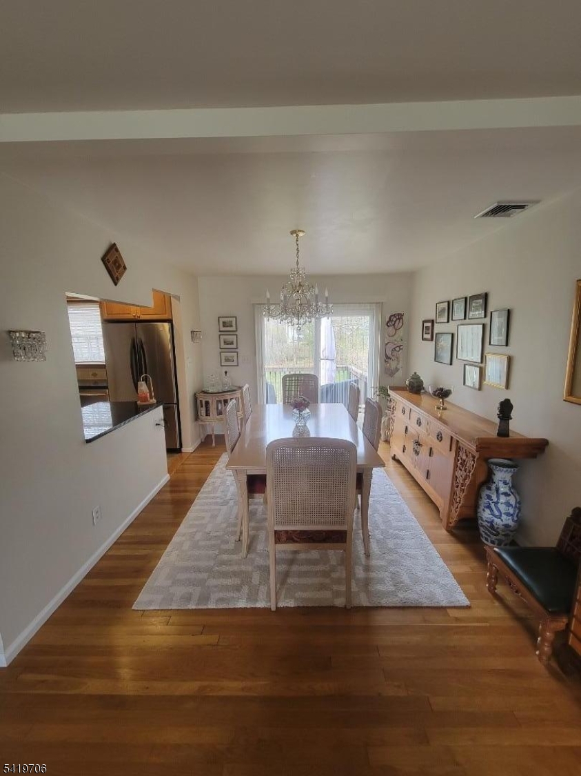 117 Tillotson Road Fanwood, NJ 07023 - Photo 13 of 30 a living room with furniture and a wooden floor