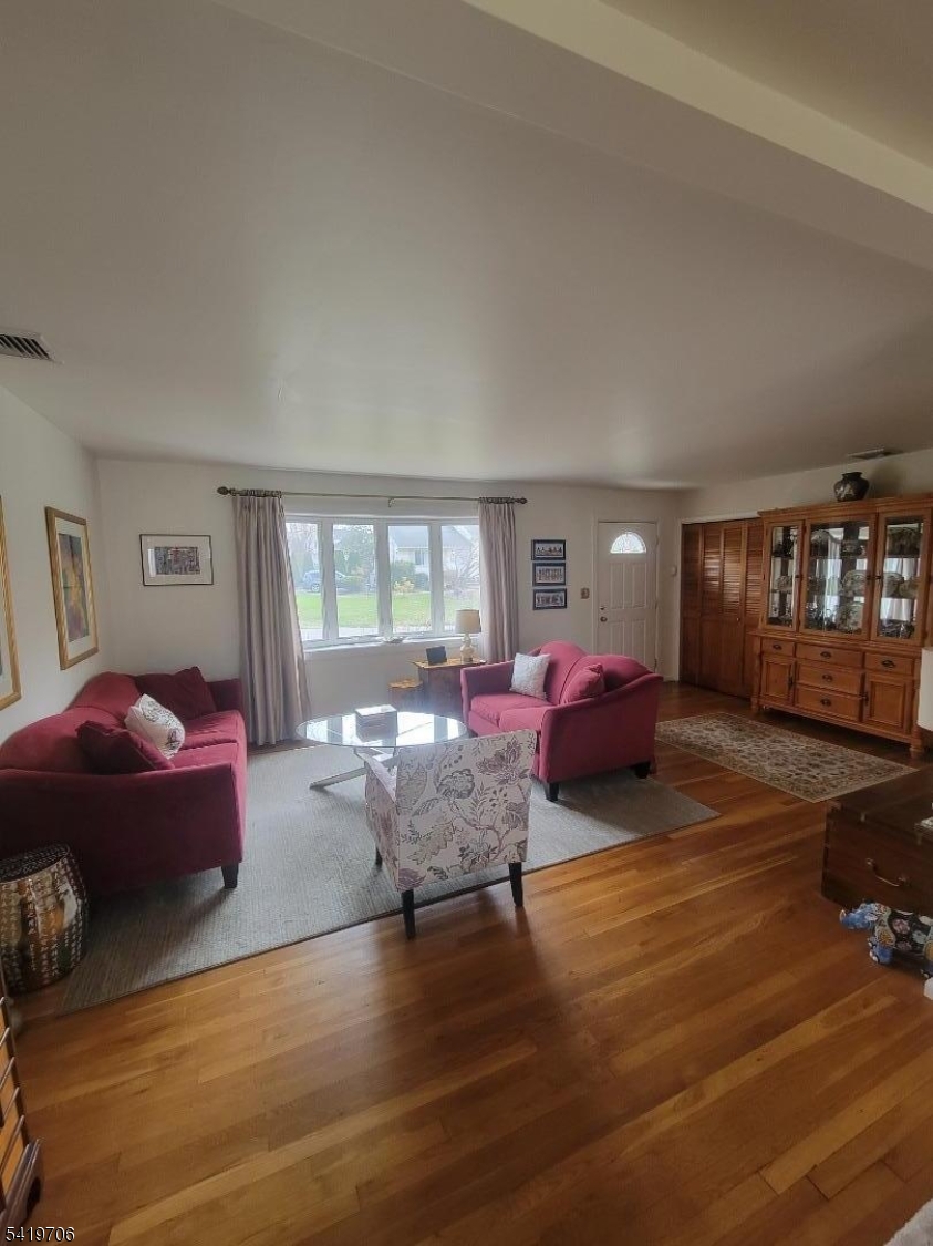 117 Tillotson Road Fanwood, NJ 07023 - Photo 14 of 30 a living room with furniture and window