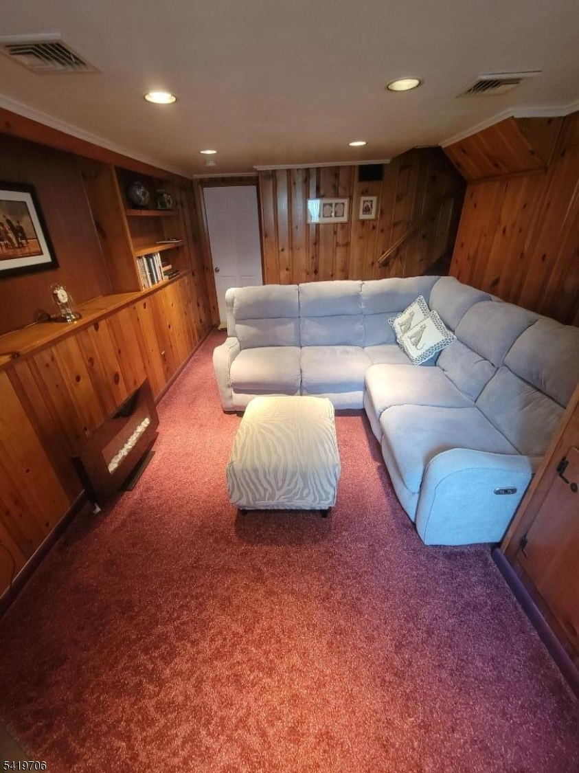 117 Tillotson Road Fanwood, NJ 07023 - Photo 17 of 30 a living room with furniture and a rug