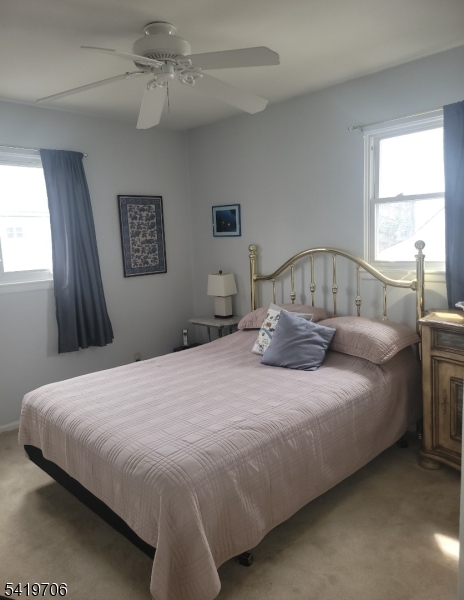 117 Tillotson Road Fanwood, NJ 07023 - Photo 19 of 30 a bedroom with a bed and a window