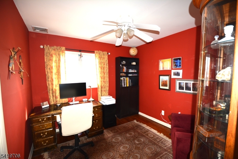 117 Tillotson Road Fanwood, NJ 07023 - Photo 21 of 30 a workspace with furniture and screen