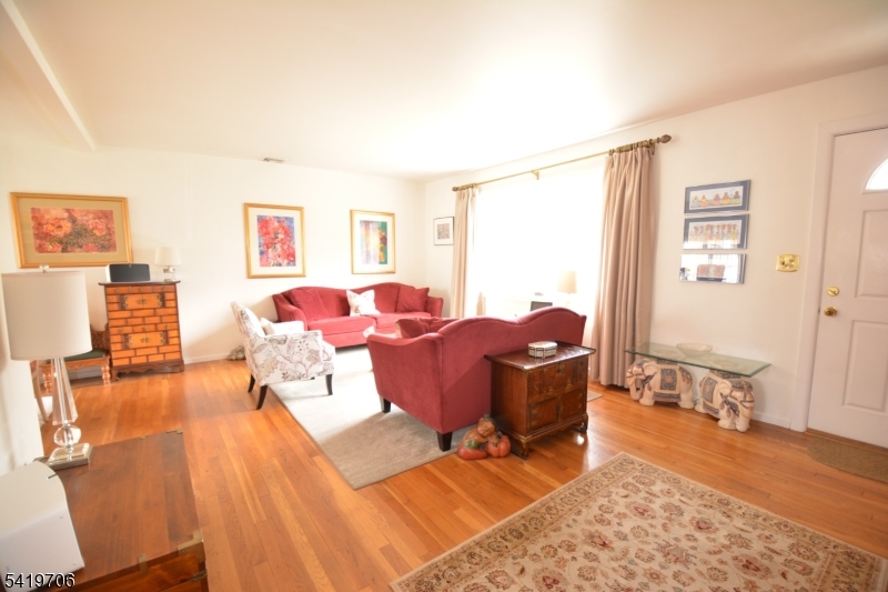 117 Tillotson Road Fanwood, NJ 07023 - Photo 3 of 30 a living room with furniture and wooden floor