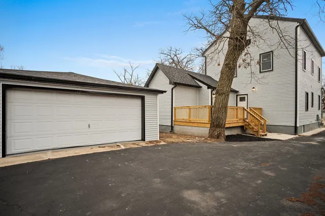 a view of a house with a parking space