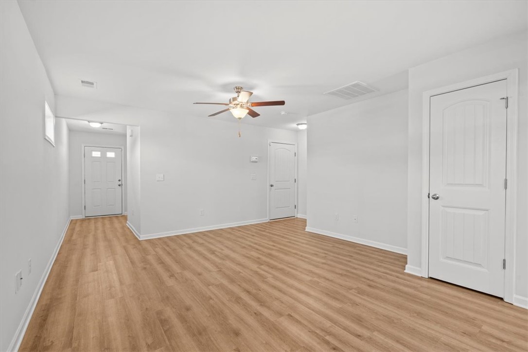 118 Adger Road Pendleton, SC 29670 - Photo 5 of 31 This bright, open space features durable flooring, offering a versatile area for everyday living.