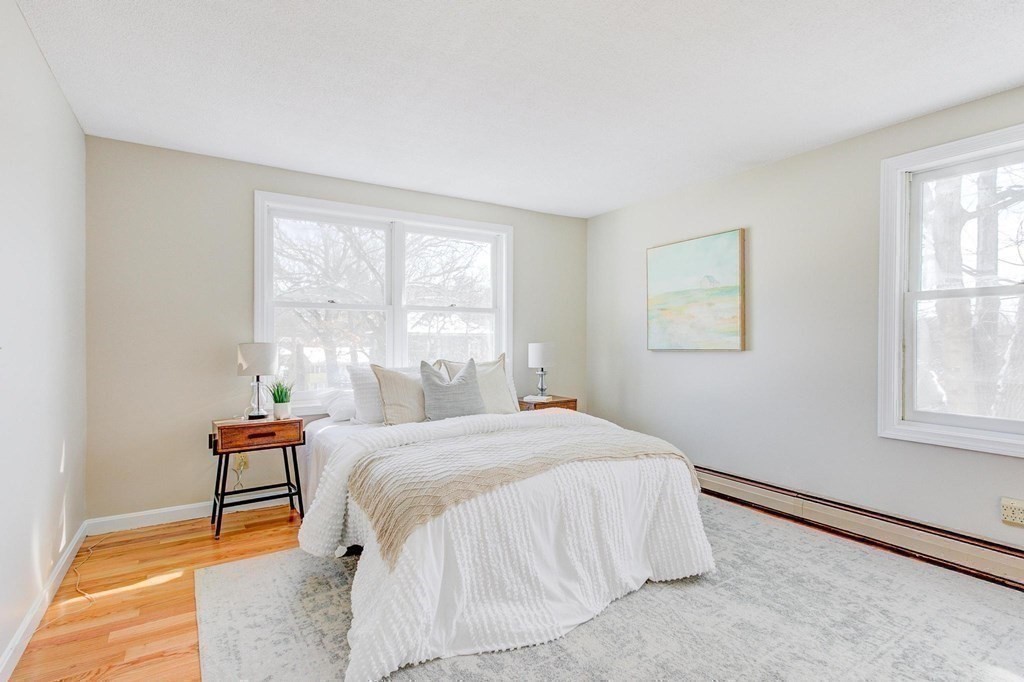68 Dothan Street Arlington, MA 02474 - Photo 12 of 42 a bedroom with a bed and a window