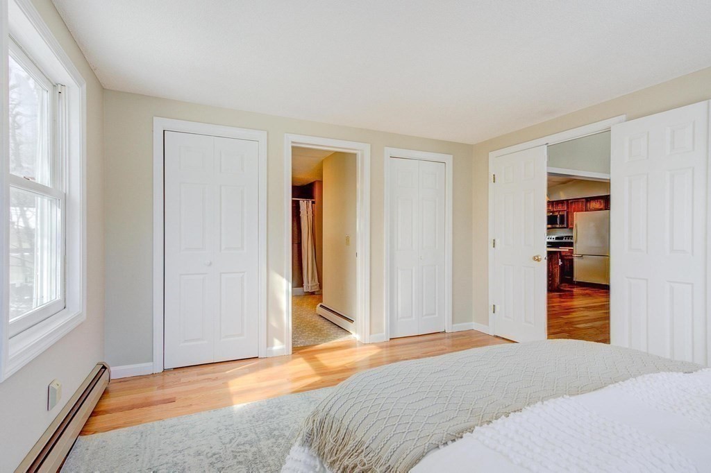 68 Dothan Street Arlington, MA 02474 - Photo 13 of 42 a bedroom with a bed and a window