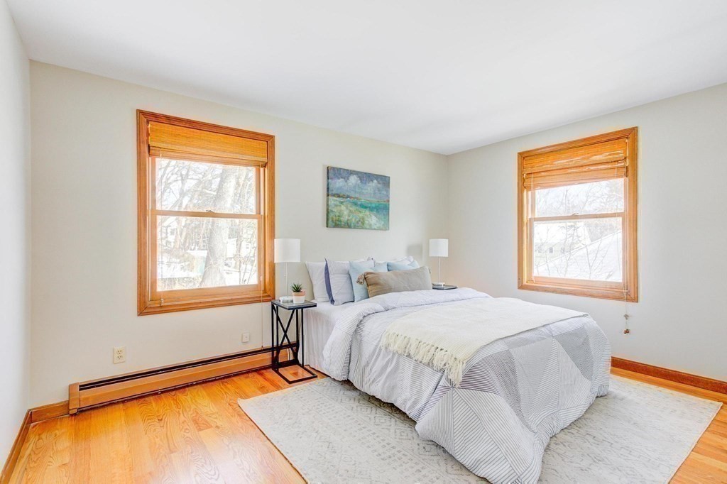 68 Dothan Street Arlington, MA 02474 - Photo 15 of 42 a bedroom with a bed and next to a window