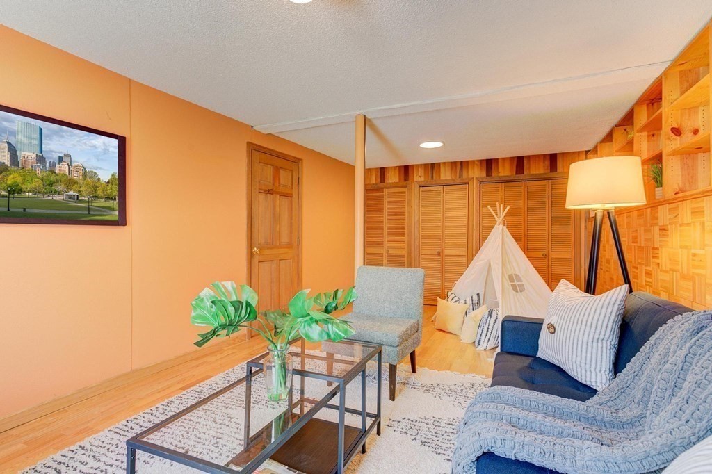 68 Dothan Street Arlington, MA 02474 - Photo 20 of 42 a balcony with furniture and wooden floor