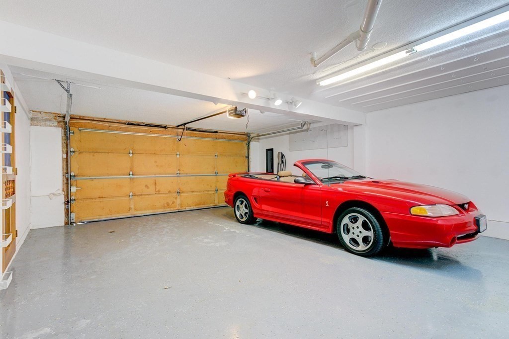 68 Dothan Street Arlington, MA 02474 - Photo 21 of 42 a car that is parked in a room