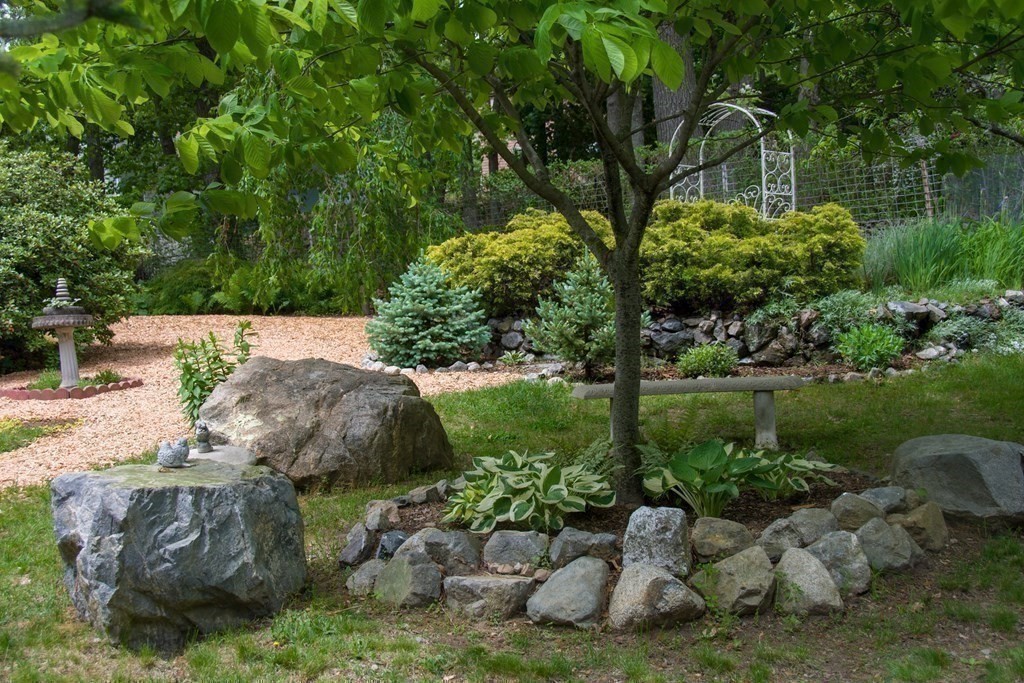 68 Dothan Street Arlington, MA 02474 - Photo 30 of 42 a view of a garden with a lake