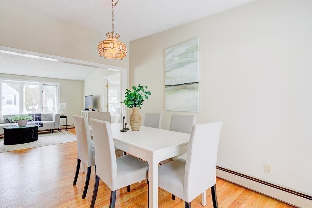 68 Dothan Street Arlington, MA 02474 - Photo 7 of 42 a view of a dining room with furniture window and wooden floor