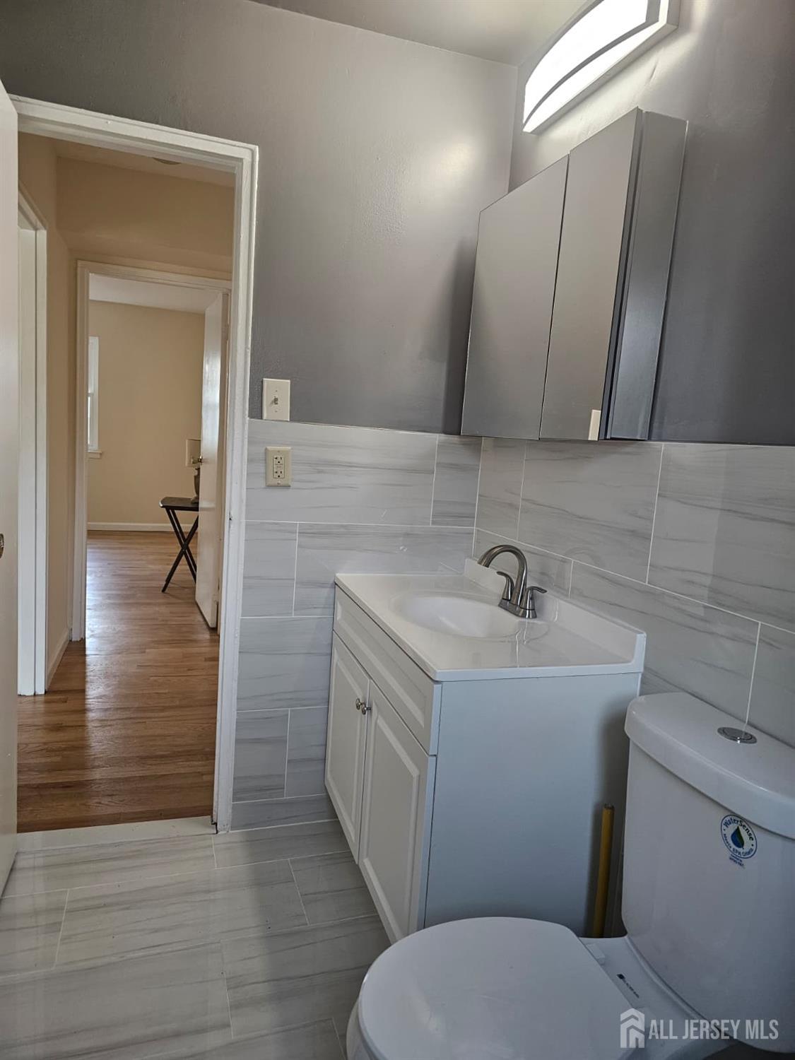 57 Judson Street, Unit 9A Edison, NJ 08837 - Photo 10 of 13 a bathroom with a sink toilet and shower