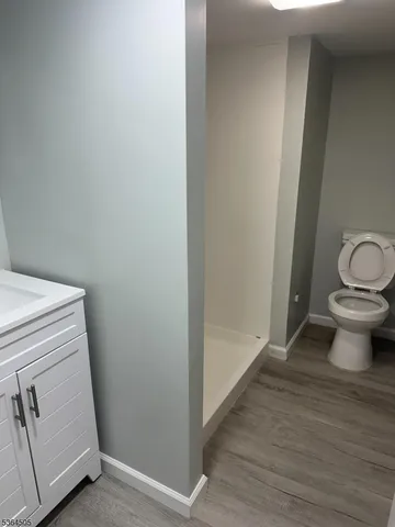 a bathroom with a sink and toilet