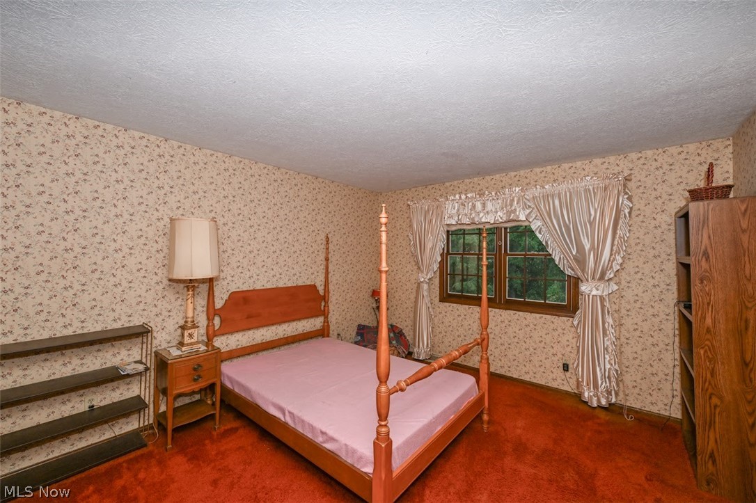 758 Inverness Road Akron, OH 44313 - Photo 35 of 46 Third bedroom featuring a textured ceiling