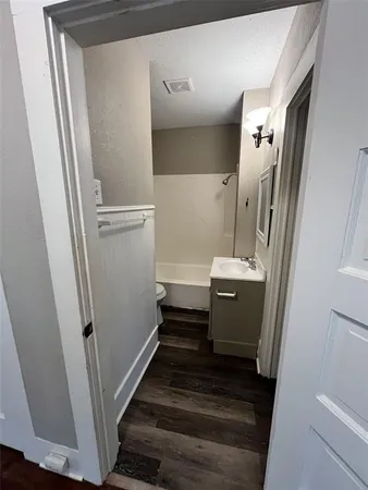 a bathroom with sink and mirror