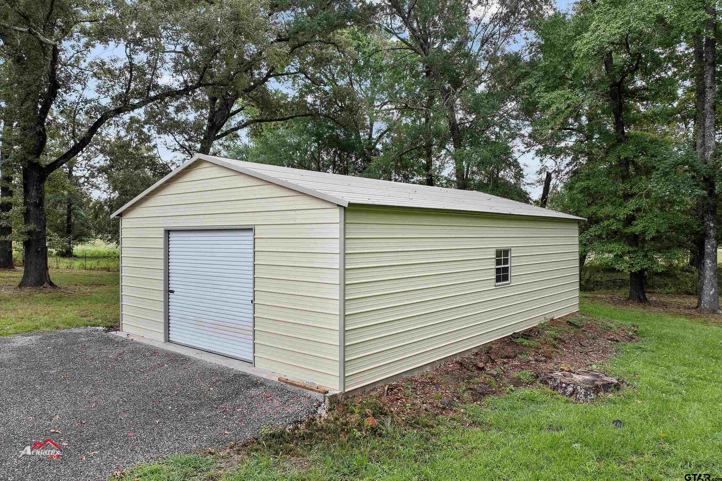 875 Old Town Road Marshall, TX 75672 - Photo 29 of 34 a view of a house with a yard