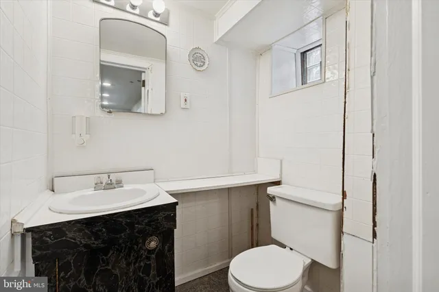 a patio with a table and chairs