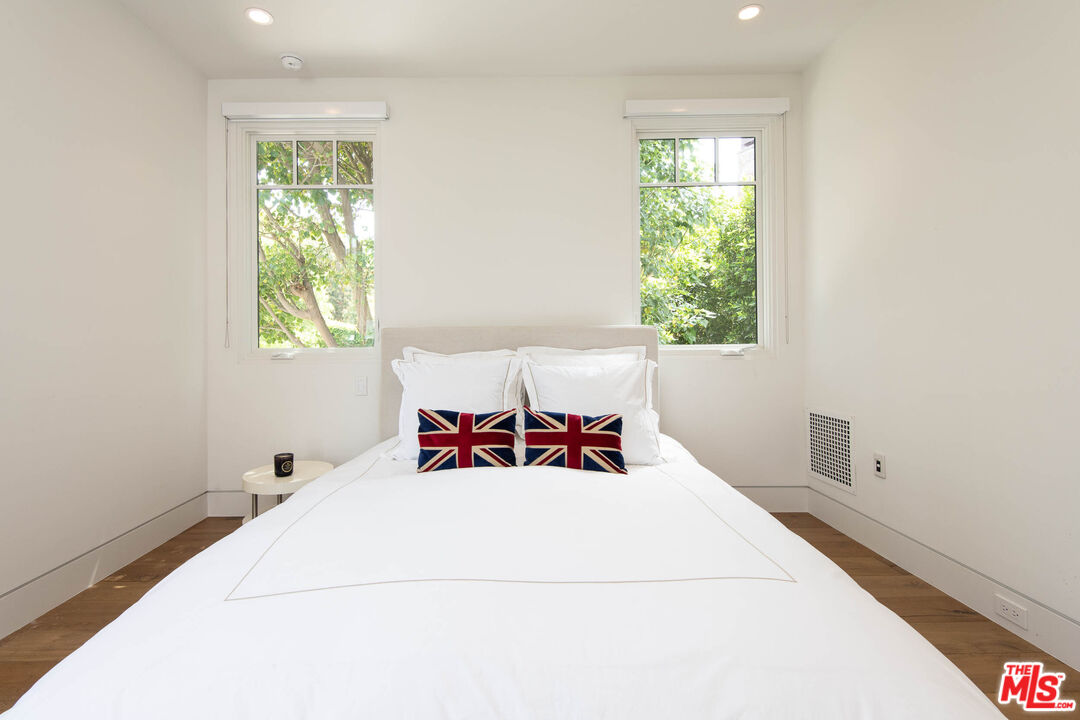 13705 Romany Drive Pacific Palisades, CA 90272 - Photo 45 of 54 a bed room with a bed and a window