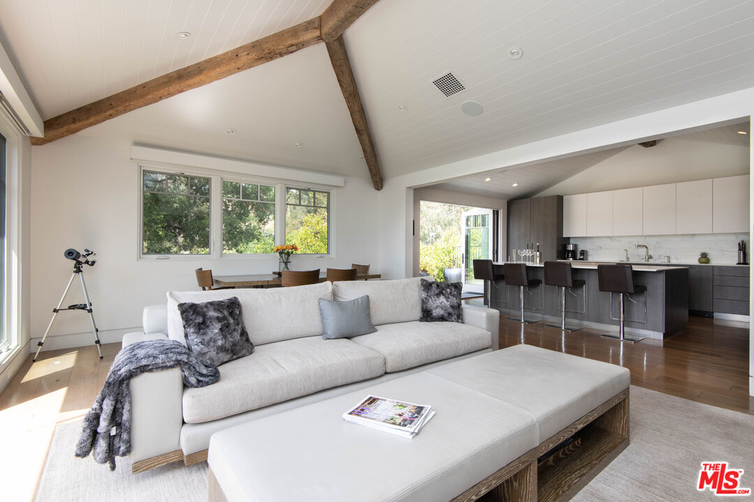 13705 Romany Drive Pacific Palisades, CA 90272 - Photo 8 of 54 a living room with furniture and a table