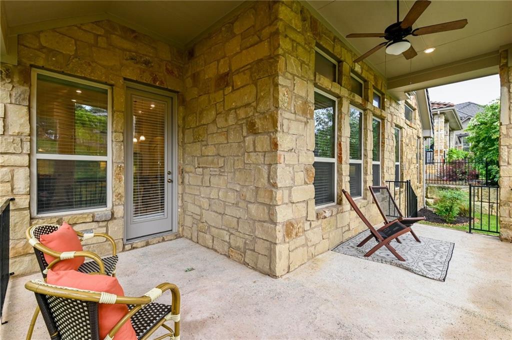 204 Maxwell Way, Unit 39 Austin, TX 78738 - Photo 23 of 26 an outdoor living room with patio furniture and garden view
