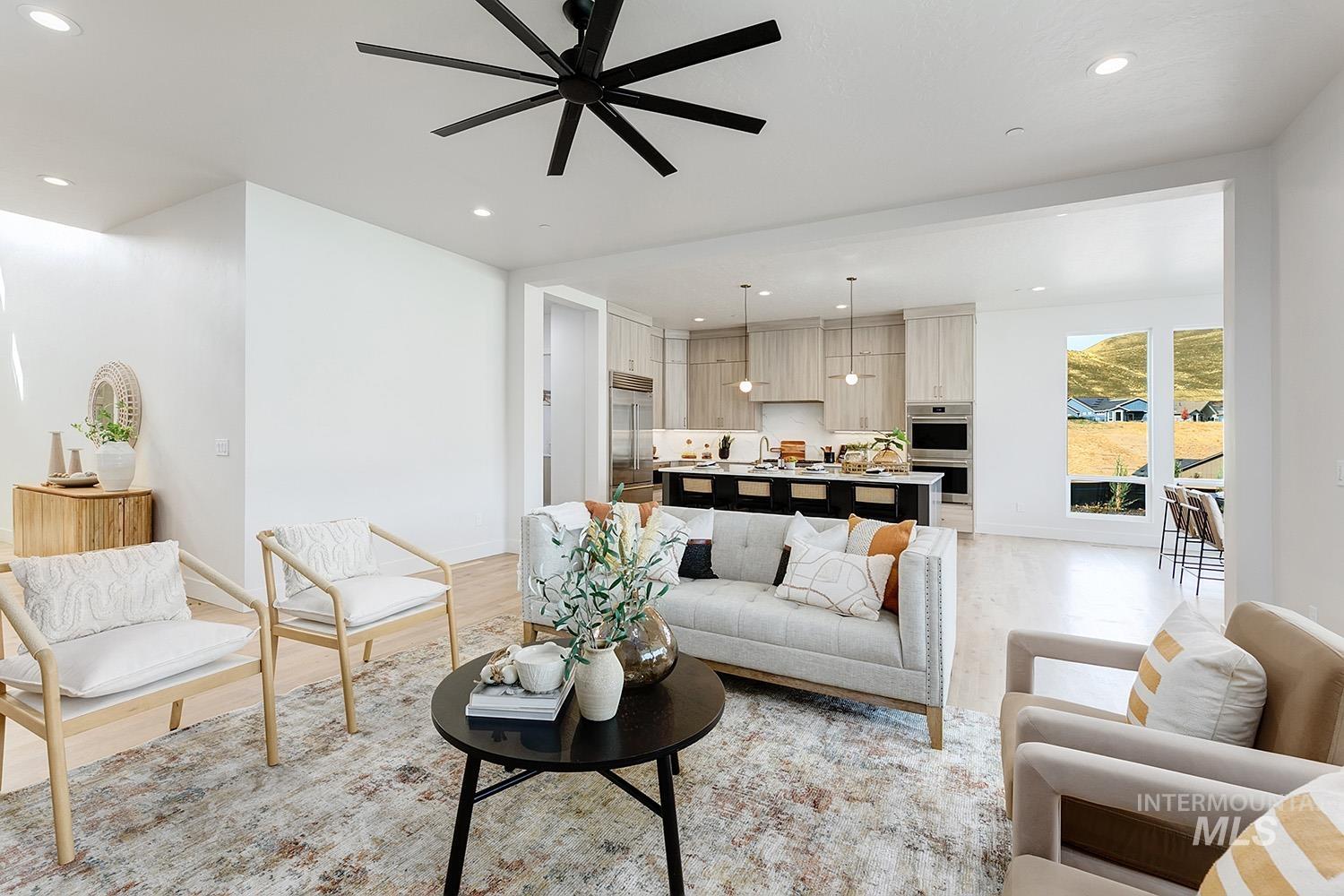 2528 South Linnet Place Boise, ID 83716 - Photo 7 of 33 Living area with recessed lighting, light wood finished floors, and a ceiling fan