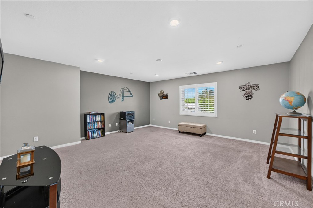23347 Crystal Way Wildomar, CA 92595 - Photo 51 of 109 a view of an empty room with a window and workspace