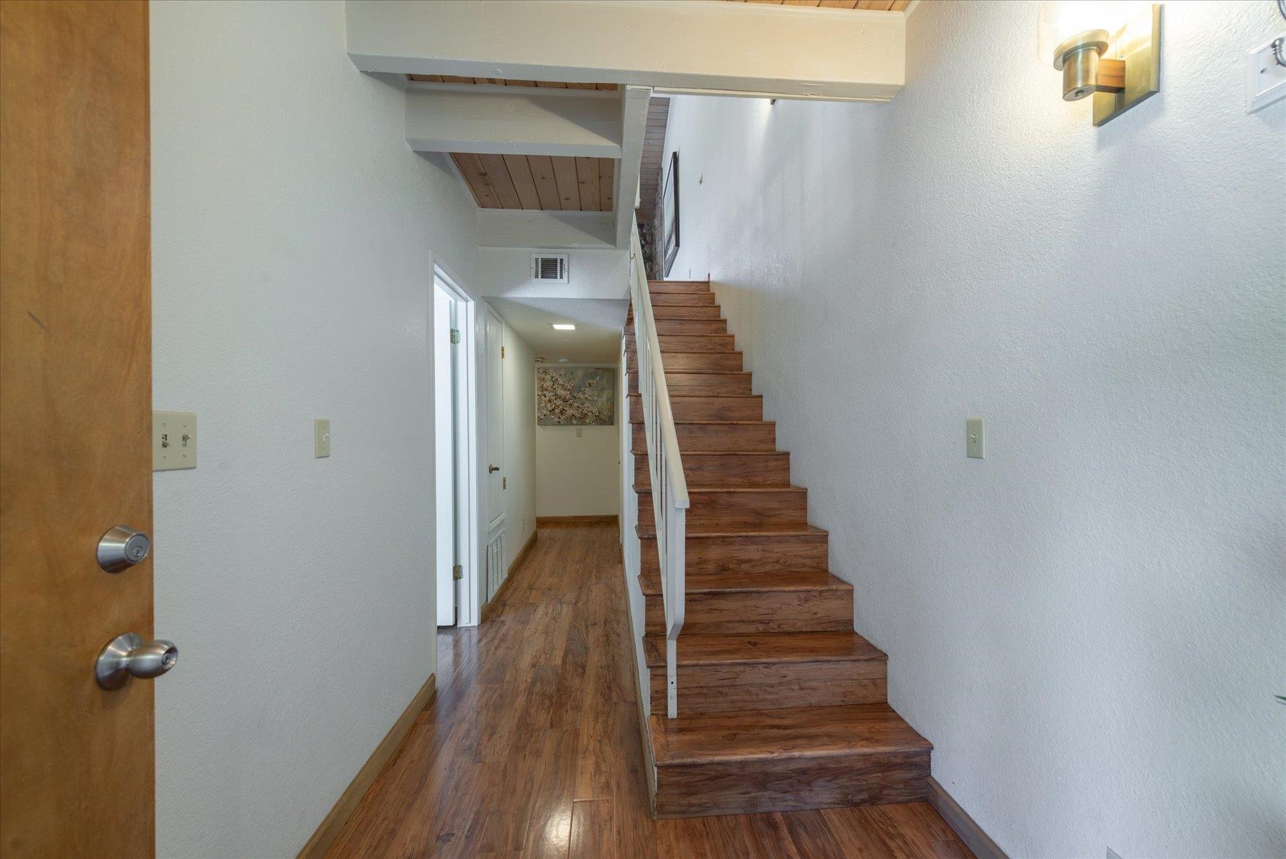 10272 Schaffer Drive Truckee, CA 96161 - Photo 3 of 20 a view of a hallway with wooden floor and entryway