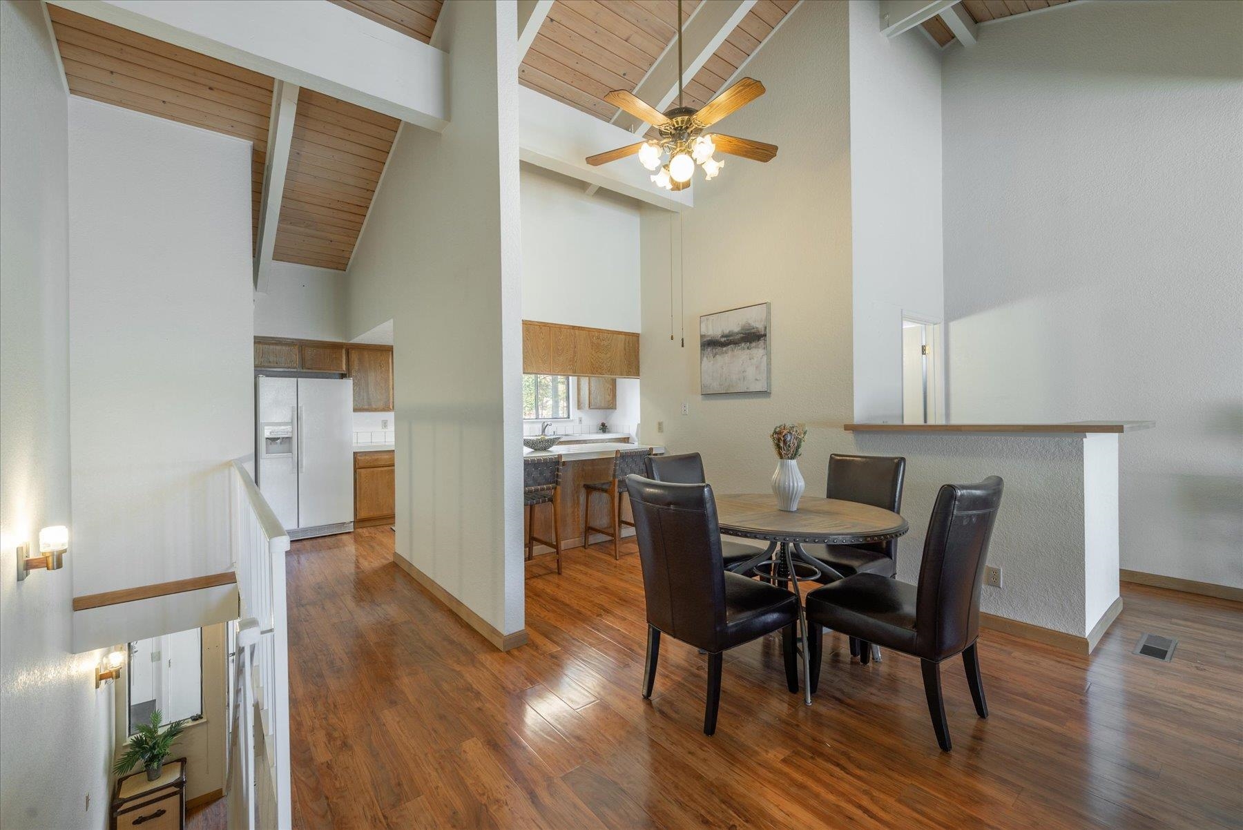 10272 Schaffer Drive Truckee, CA 96161 - Photo 7 of 20 a view of a dining room with furniture and wooden floor