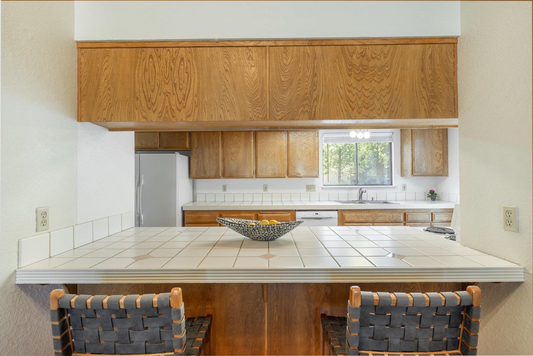 10272 Schaffer Drive Truckee, CA 96161 - Photo 9 of 20 a kitchen with a sink and a wooden floor