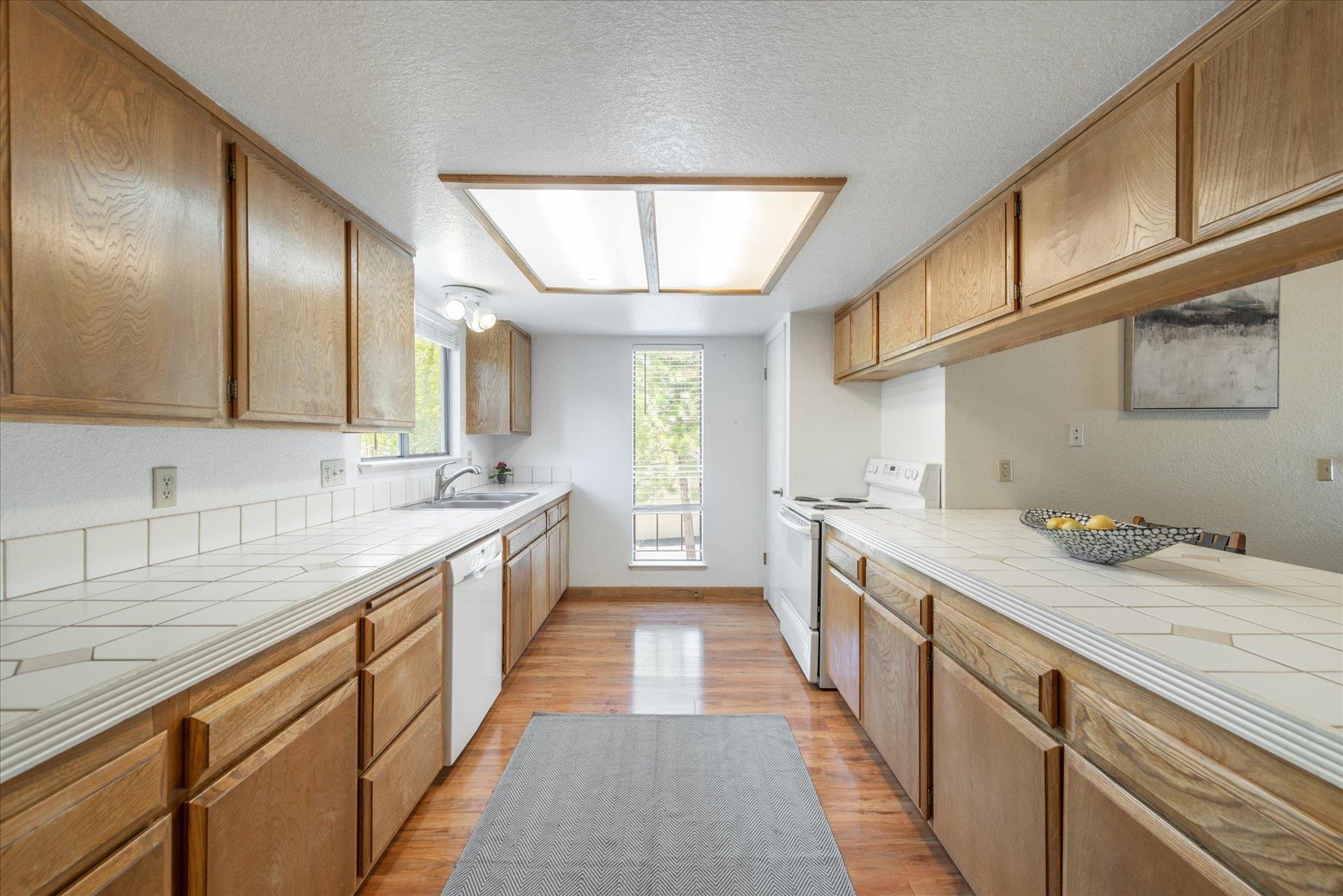 10272 Schaffer Drive Truckee, CA 96161 - Photo 10 of 20 a large kitchen with a sink and cabinets