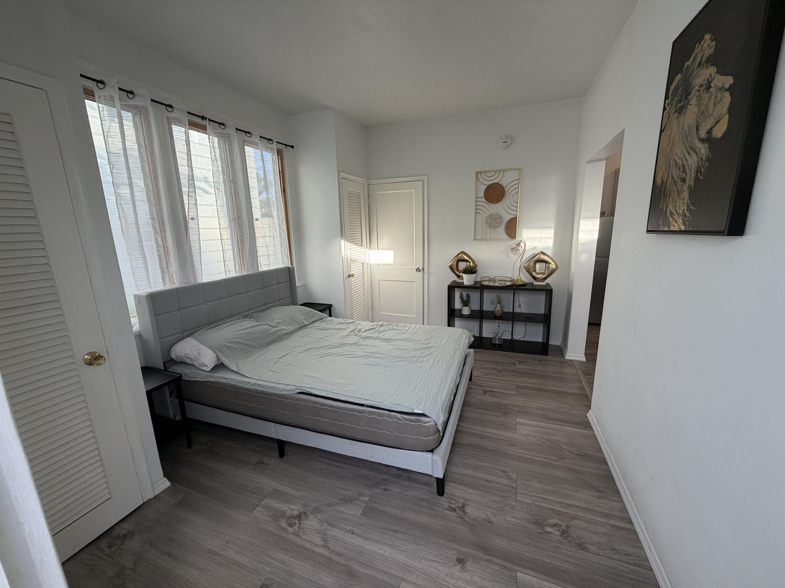 811 Southeast 16th Street Fort Lauderdale, FL 33316 - Photo 25 of 25 a bedroom with a bed and window