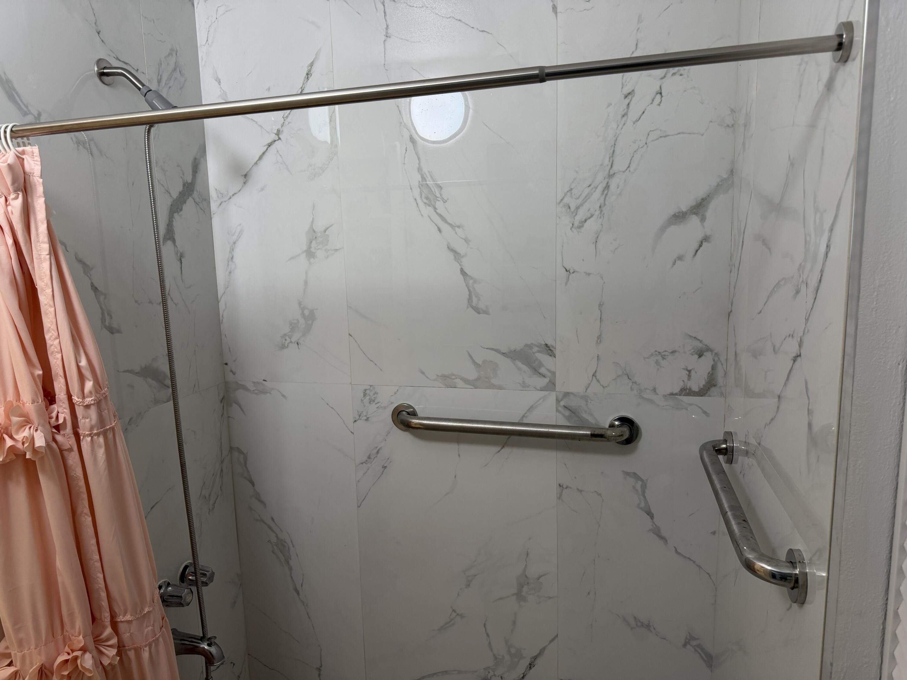 811 Southeast 16th Street Fort Lauderdale, FL 33316 - Photo 10 of 25 a bathroom with a shower