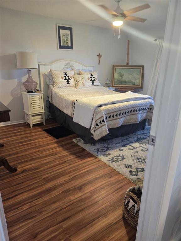 6800 Placida Road, Unit 167 Englewood, FL 34224 - Photo 23 of 44 a bedroom with a bed and a mirror