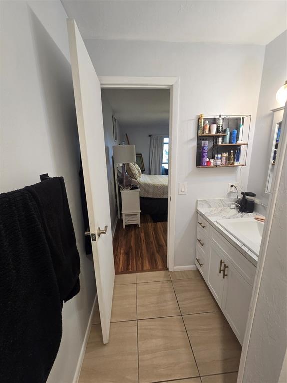 6800 Placida Road, Unit 167 Englewood, FL 34224 - Photo 30 of 44 a bathroom with a sink and a mirror