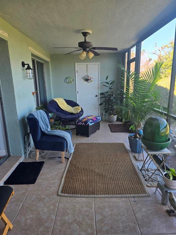 6800 Placida Road, Unit 167 Englewood, FL 34224 - Photo 32 of 44 a living room with furniture rug and window