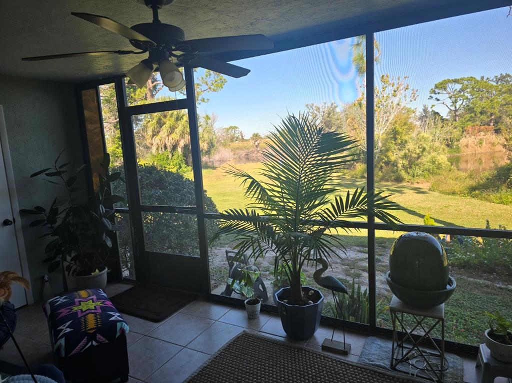 6800 Placida Road, Unit 167 Englewood, FL 34224 - Photo 34 of 44 a living room with furniture and a potted plant
