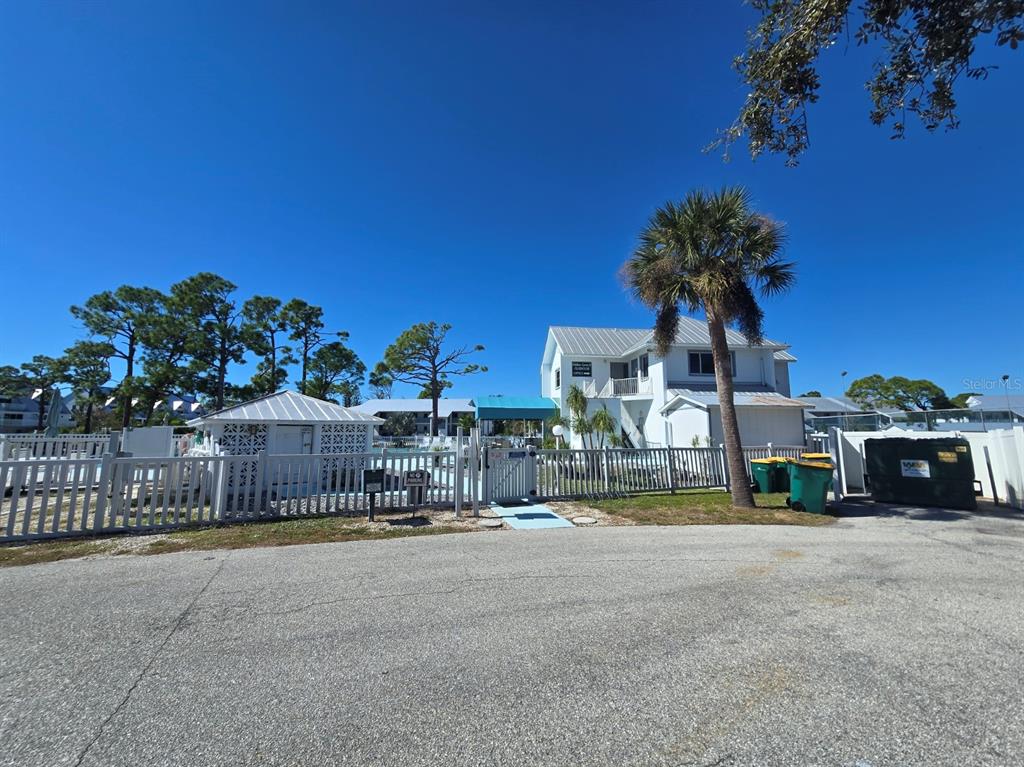 6800 Placida Road, Unit 167 Englewood, FL 34224 - Photo 42 of 44 a view of a chairs and tables in the patio