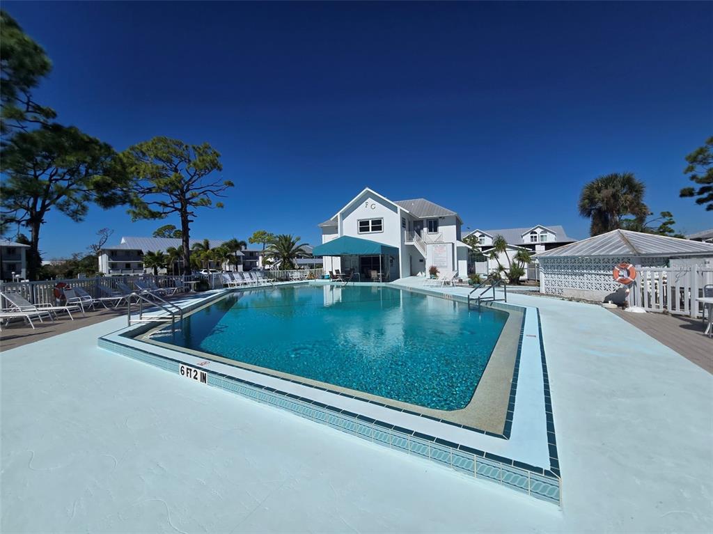 6800 Placida Road, Unit 167 Englewood, FL 34224 - Photo 44 of 44 a view of swimming pool with a chairs
