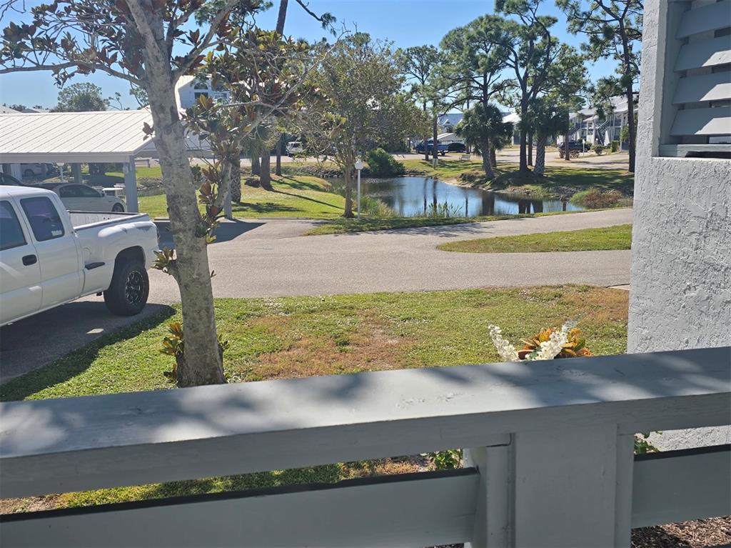 6800 Placida Road, Unit 167 Englewood, FL 34224 - Photo 5 of 44 a view of swimming pool with a yard