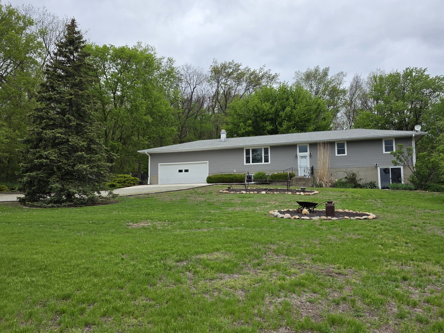 15510 Lomax Road Prophetstown, IL 61277 - Photo 2 of 24 a front view of house with yard and green space