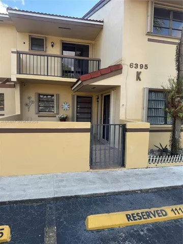 a view of a house with roof deck
