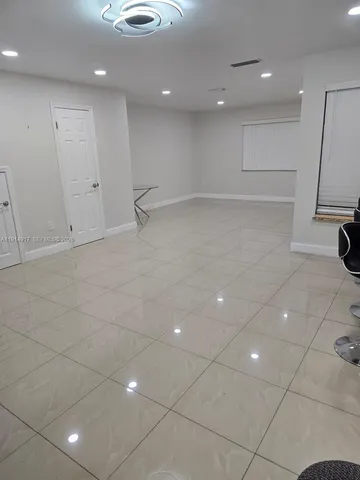 a view of a livingroom with a furniture