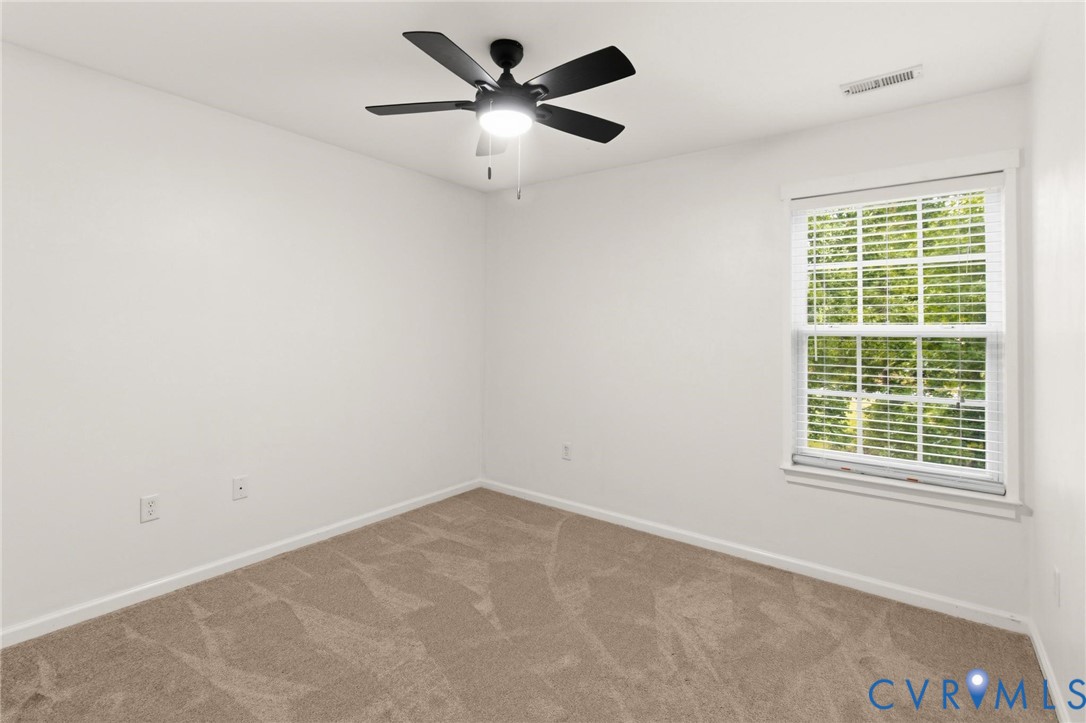 7807 Clover Ridge Place Chesterfield, VA 23832 - Photo 21 of 51 Room featuring neutral wall tones, textured carpet