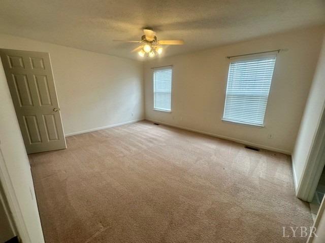 1095 Middle View Drive Forest, VA 24551 - Photo 12 of 25 an empty room with windows and entrance