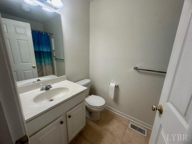 1095 Middle View Drive Forest, VA 24551 - Photo 16 of 25 a bathroom with a sink toilet and a mirror