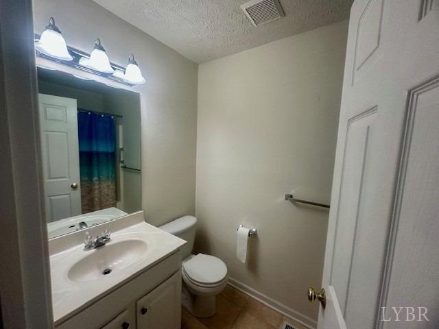 1095 Middle View Drive Forest, VA 24551 - Photo 17 of 25 a bathroom with a sink and mirror with toilet
