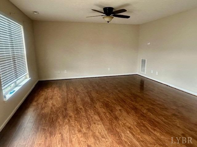 1095 Middle View Drive Forest, VA 24551 - Photo 2 of 25 wooden floor in an empty room with a window